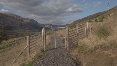 A-closed-gate-on-a-walking-trail-in-Cairndow