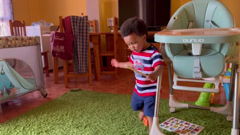 Two-year-old-african-child-spinning-funny-on-his-heels-and-a-little-dizzy