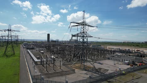 Transmission-towers-Grain-Electrical-substation-Kent-UK-rising-drone-aerial-view