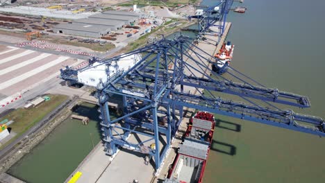 Quay-cranes-point-of-view-London-Thamesport,Container-port-river-Medway-Kent-UK-drone-aerial-view