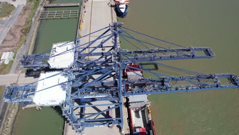 Birds-eye-view-quay-cranes-London-Thamesport,Container-port-river-Medway-Kent-UK-drone-aerial