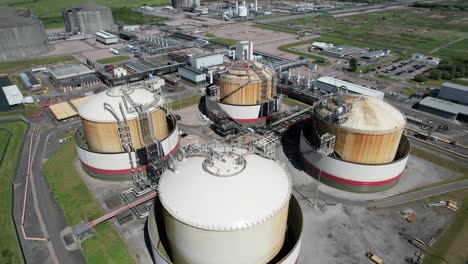 Close-up-drone-view-National-grid-Grain-LNG-Terminal-gas-storage-Kent-UK-drone-aerial-view
