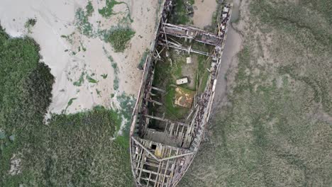 slow-rising-Shipwreck-river-medway-Kent-UK-drone-aerial-view