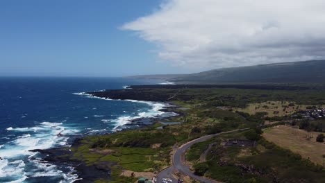 4K-cinematic-drone-shot-of-waves-crashing-on-the-lava-rock-coast-near-Punulu'u-Black-Sand-Beach-on-Hawaii's-Big-Island