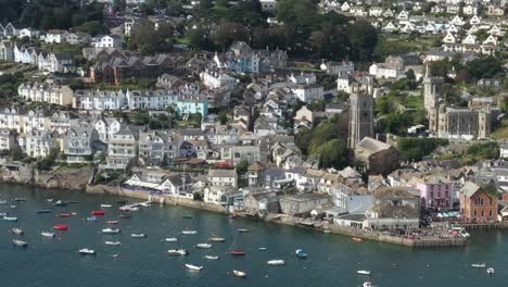 Aerial-view-of-Porphry-Hall,-and-the-Cornish-town-of-Fowey-in-Cornwall,-UK