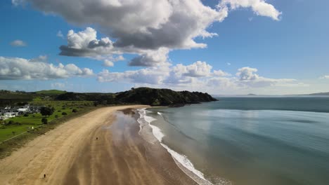 Cinematic-drone-flight-over-Coopers-beach-in-New-Zealands-Doubtless-bay
