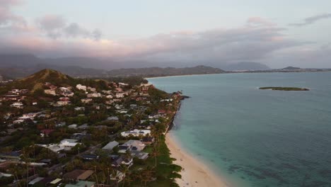 4K-cinematic-zoom-out-drone-shot-of-Lanikai-Beach-and-the-Oahu-coast-on-the-Eastside-during-sunrise
