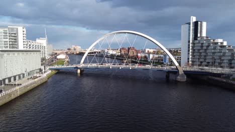 Aerial-Drone-Shot-of-Squinty-Bridge-on-River-Clyde-in-Glasgow-City-Centre-Scoland