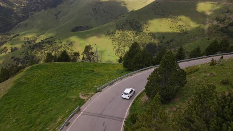 Aerial-views-of-a-car-in-a-mountain-road-in-Andorra