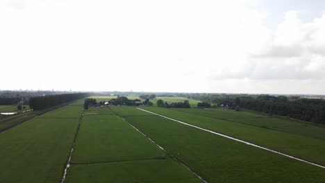 Typical-dutch-landscape-from-the-sky,-drone-footage-of-the-Dutch-meadow