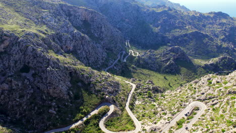 Flying-above-a-serpentine-road-in-Serra-de-Tramuntana,-Mallorca