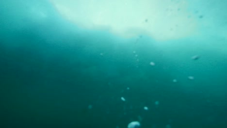 Wave-crashing-under-water-perspective