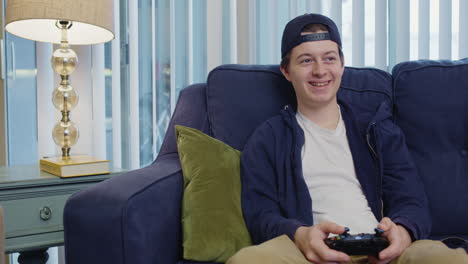 Young-man-plays-video-games-happily