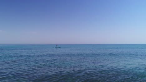 Adult-on-a-Stand-Up-Paddle-Board