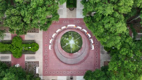 Aerial-view-of-water-fountain-in-a-park-in-Mobile,-Alabama
