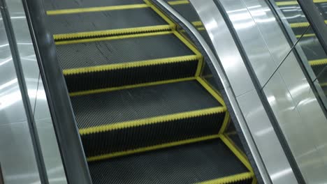 escalator-in-international-airport-without-people-while-operating