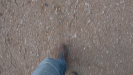 Man-hiker-boots-walking-on-a-path