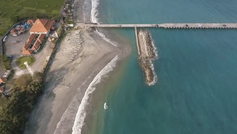 tanah-ampo-pier-reveal-blue-water-beach-from-above