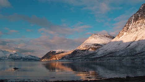 Cinematic-low-level-tracking-shot-on-the-edge-of-a-fjord-near-Tromso