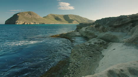 Cinematic-tracking-shot-left-to-right-of-a-sandstone-coastline