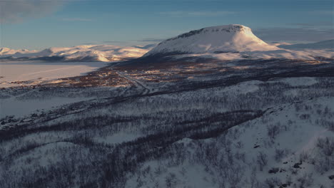 Stunning-cinematic-aerial-shot-looking-towards-Kilpisjarvi,-Finland