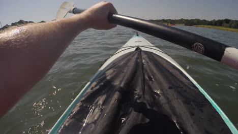 First-person-point-of-view-POV-kayaking-on-the-Beaulieu-River-South-England-UK-near-the-New-Forest