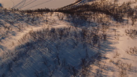 Cinematic-aerial-tilt-up-shot-on-the-Sweden-Finland-Norway-border