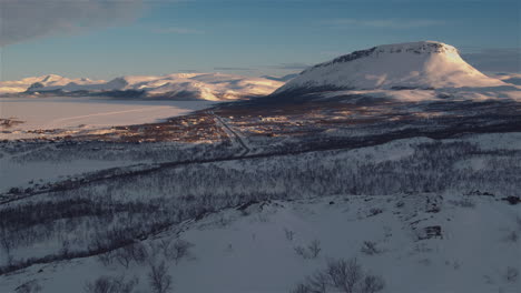 Stunning-dynamic-and-cinematic-aerial-shot-towards-Kilpisjarvi,-Finland