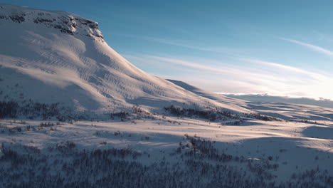Absolutely-stunning-cinematic-aerial-shot-of-a-mountain-near-Kilpisjarvi