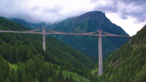 Stunning-cinematic-shot-of-a-concrete-bridge-in-Switzerland