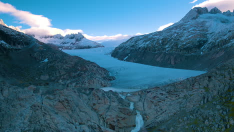 Stunning-cinematic-aerial-shot-of-Rhone-Glacier,-Switzerland
