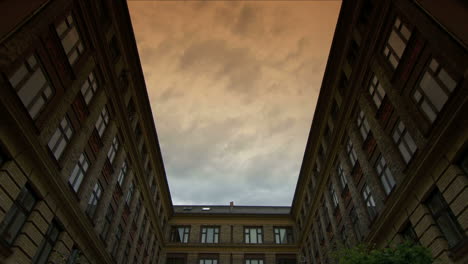 Clouds-passing-over-courtyard,-Copenhagen