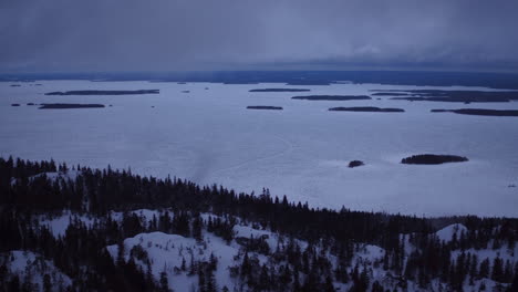 Stunning-cinematic-aerial-dawn-shot-of-Lake-Pielinen,-Finland