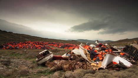 Shocking-timelapse-of-wrecked-refugee-boats-and-lifejackets-on-Lesbos,-Greece