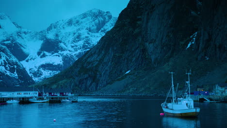 Cinematic-shot-of-a-fishing-boat-in-Hamnoy,-Lofoten
