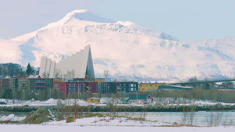 Tromso-Arctic-Cathedral,-apartments-in-the-foreground