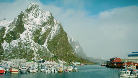 Cinematic-wide-shot-of-boats-in-Svolvaer-harbour,-Lofoten,-Norway