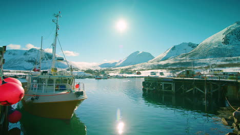 Stunning-shot-of-a-fishing-boat-in-Tromvik-harbour,-northern-Norway