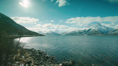 Cinematic-tracking-shot-of-Lyngen-fjord-by-the-E6,-northern-Norway