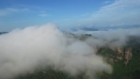 Jaw-dropping-reversal-aerial-shot-of-cloudy-Wuyishang-mountains-in-China