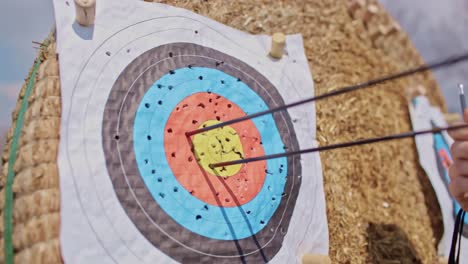 Archer-pull-out-the-arrows-from-the-hit-target