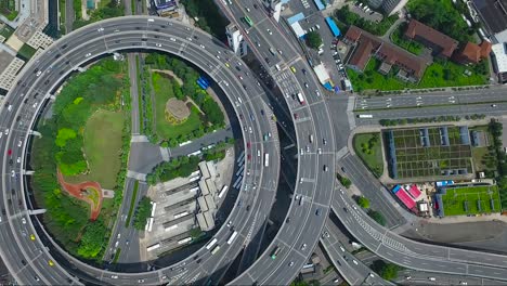 Hypnotic-aerial-shot-over-a-circular-highway-in-Shanghai-China