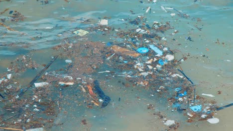 Plastic-litter-and-debris-floating-in-ocean-off-coast-of-Curacao,-Caribbean