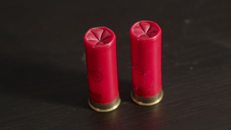 12-gauge-shotgun-shells-standing-on-table