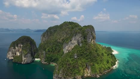 Marvelous-aerial-shot-of-limestone-cliffs-on-an-exotic-tropical-island
