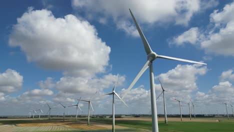 Rotating-Shot-Revealing-A-Whole-Group-Of-Wind-Turbines-At-A-Wind-Farm