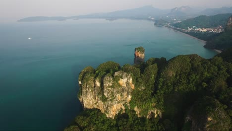 Great-reversal-drone-shot-from-limestone-cliffs-on-a-tropical-island