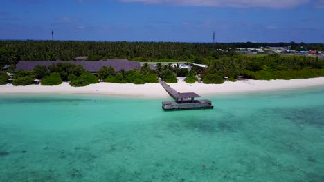 Close-up-aerial-drift-of-Maldives-dock-on-secluded-island