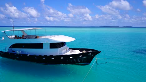 Private-yacht-lingering-in-stunning-crystal-clear-Maltese-waters