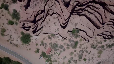 Aerial-drone-view-over-the-dramatic-red-rock-formations-of-the-Calchaquí-Valleys-in-Argentina